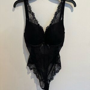Sophisticated Black Lace Bodysuit with Sheer Panels from Paris